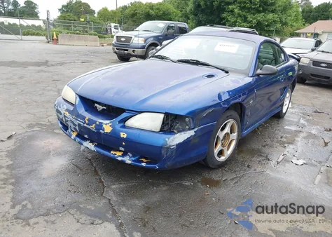 1997 Ford Mustang из США, поврежденный, VIN 1FALP4048VF107519